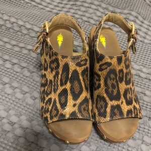 Volatile size 7 cheetah wedge. So comfy!!! Lightly worn